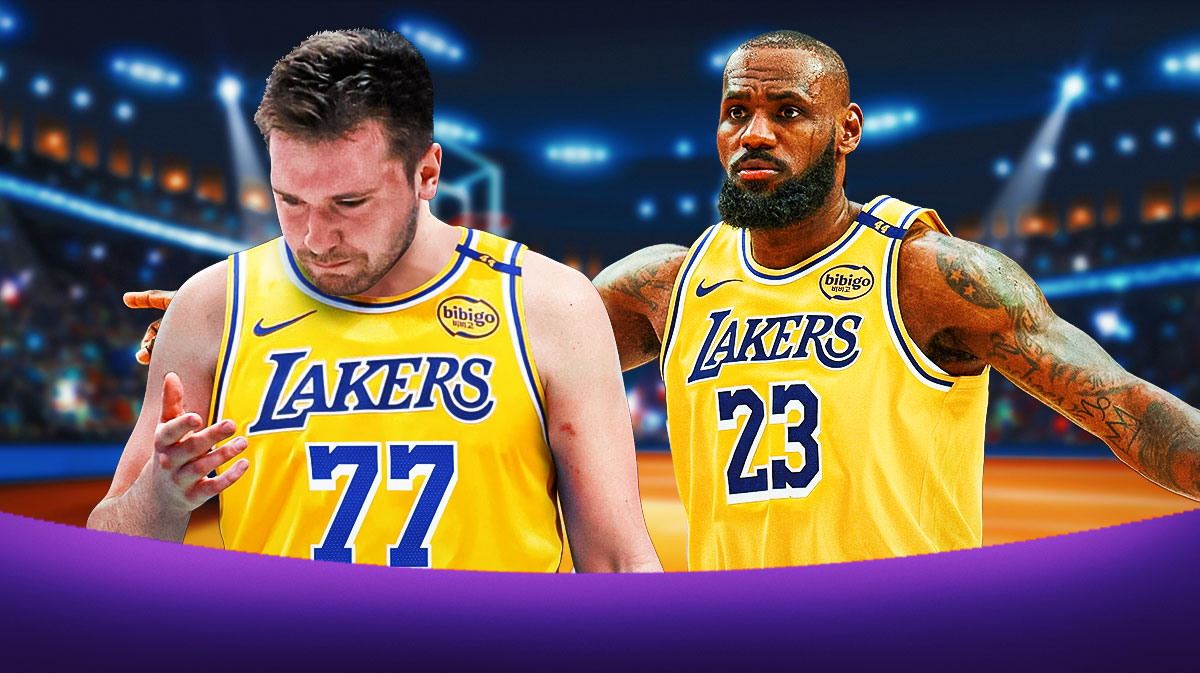 Lakers LeBron James with Lakers Luka Doncic looking down