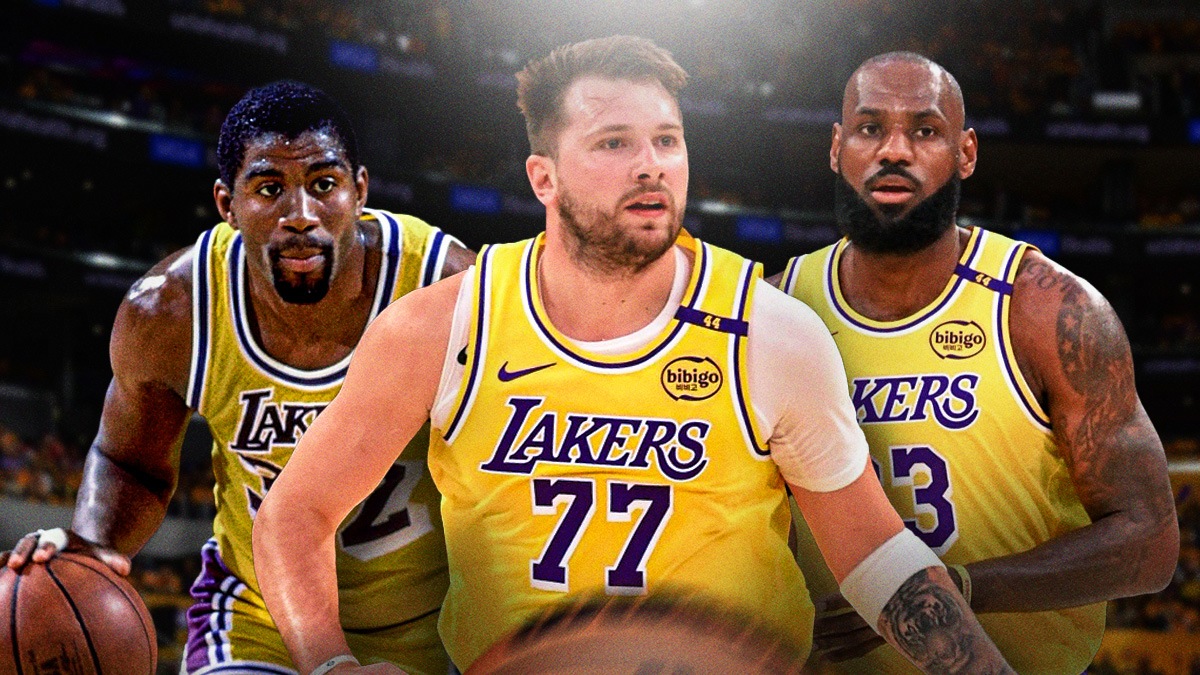 Magic Johnson next to Luka Doncic and LeBron James in their Lakers uniforms.