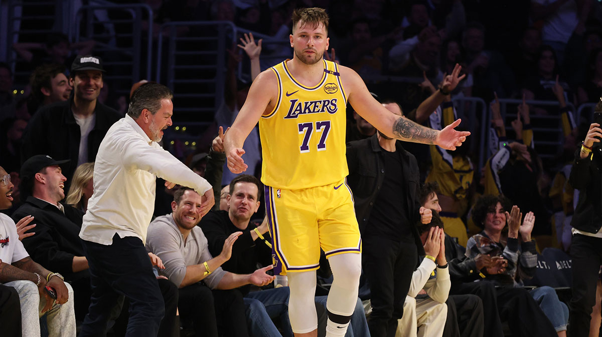 Los Angeles Lakers guard Luka Doncic (77) reacts after making a basket during the fourth quarter against the Minnesota Timberwolves at Crypto.com Arena.