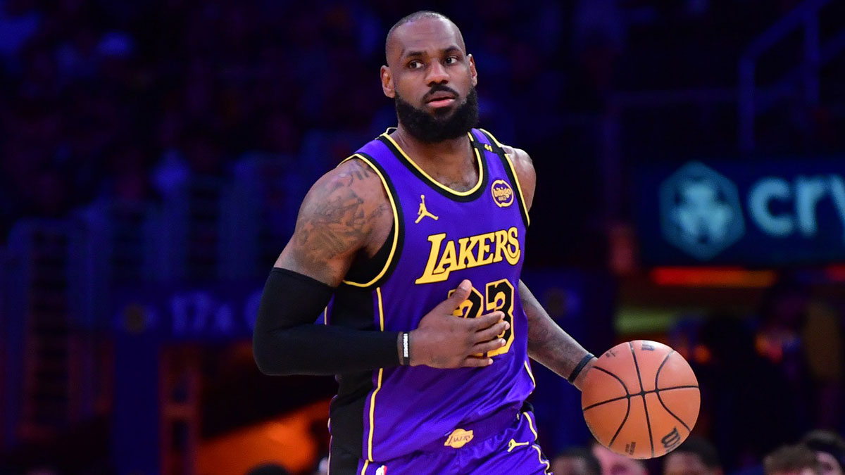 Lakers forward LeBron James (23) dribbles the ball against the Dallas Mavericks during the second half at Crypto.com Arena