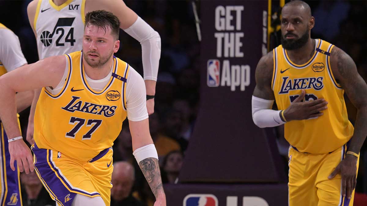 Lakers Guard Luka Doncic (77) Takes the ball down as far as Lebron James (23), watches against Jazz Utah at Cripto.com Arena