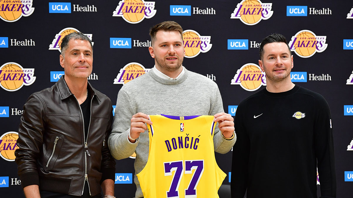 Lakers Guard Luka Dončić presents photos with General Manager Rob Pelinka and General Trainer JJ Redick at UCLA Health Center