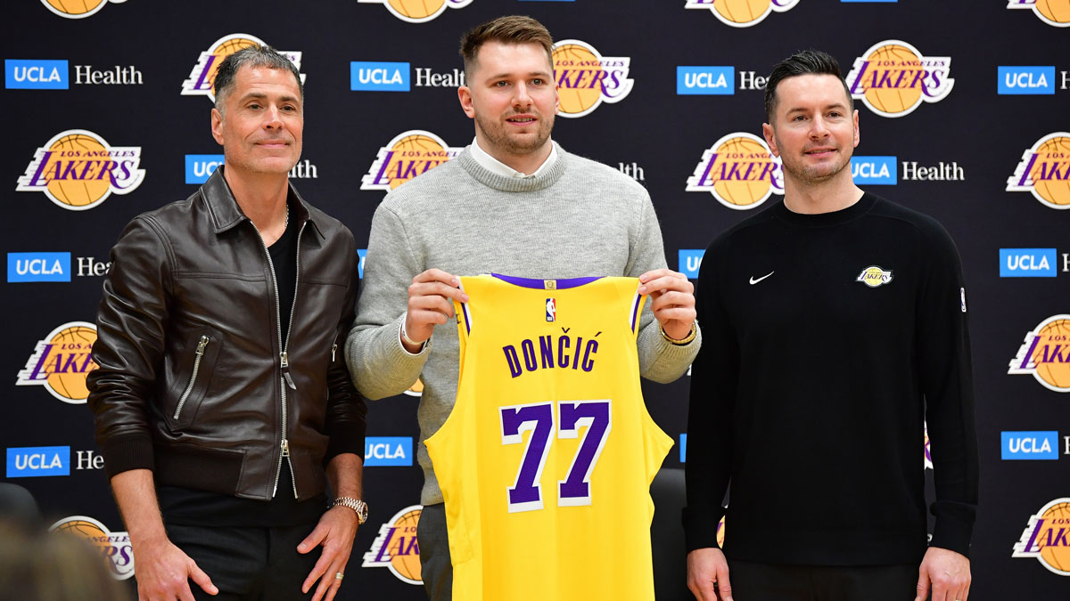 Lakers Guard Luka Dončić presents photos with General Manager Rob Pelinka and General Trainer JJ Redick at UCLA Health Center