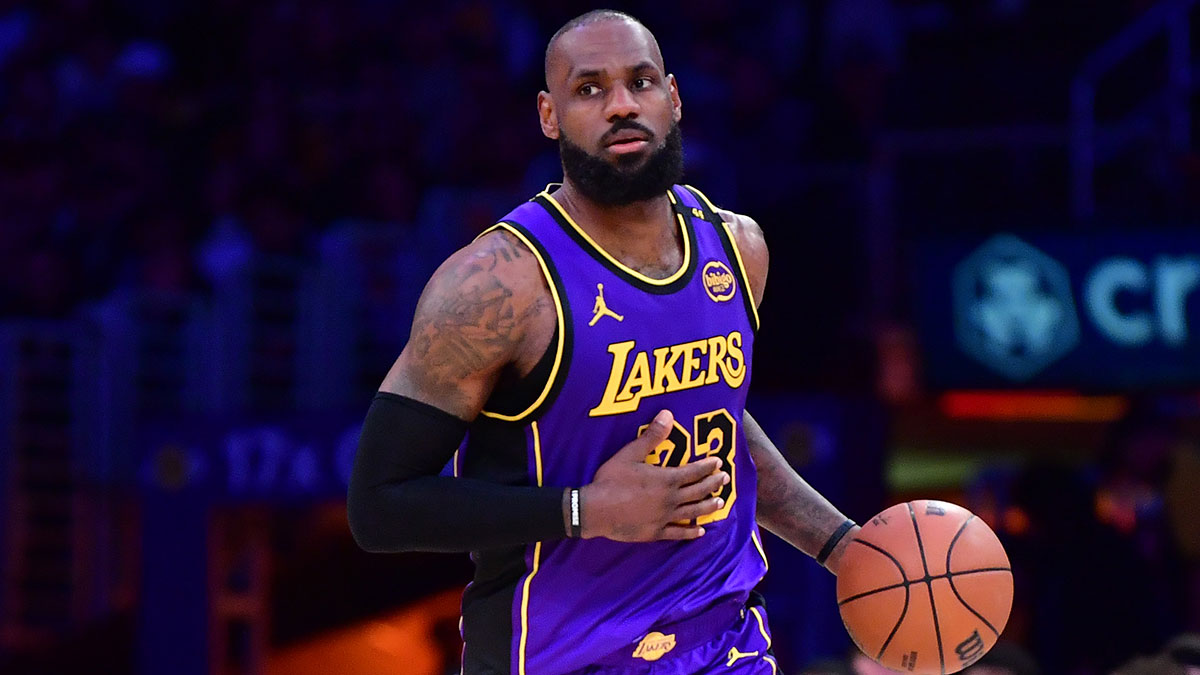 Los Angeles Lakers forward LeBron James (23) dribbles the ball against the Dallas Mavericks during the second half at Crypto.com Arena.