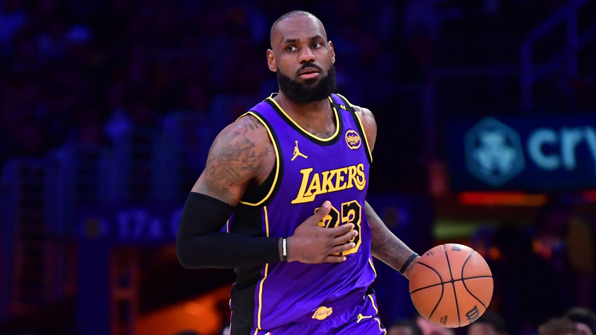 Los Angeles Lakers forward LeBron James (23) dribbles the ball against the Dallas Mavericks during the second half at Crypto.com Arena.