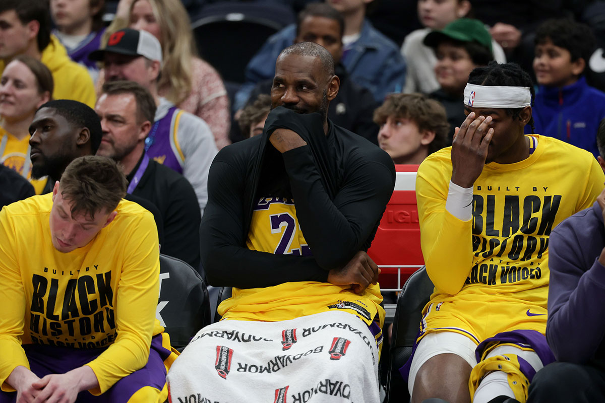 Los Angeles Lakers forward LeBron James (23) laughs on the bench during the second half against the Utah Jazz at Delta Center.