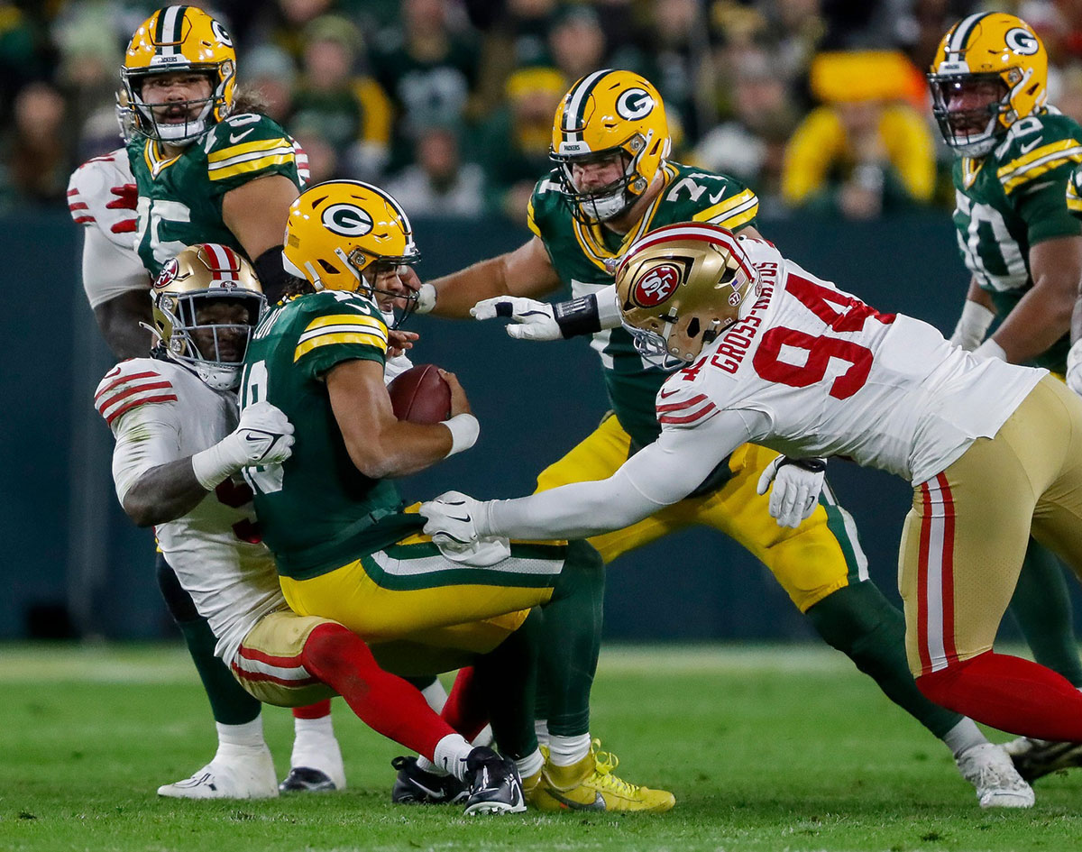 San Francisco 49ers defensive end Leonard Floyd (56) sacks Tampa Bay Buccaneers quarterback Jordan Love (10) on Sunday, November 24, 2024, at Lambeau Field in Tampa Bay, Wis. The Buccaneers won the game, 38-10.