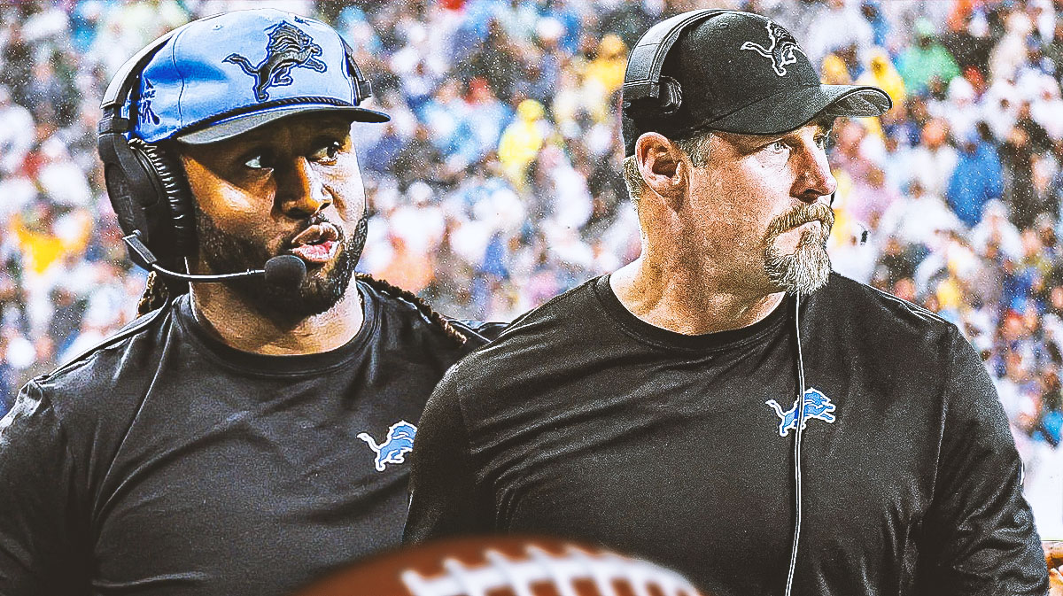 Detroit Lions defensive coordinator Kelvin Sheppard with head coach Dan Campbell. There is also a logo for the Detroit Lions.