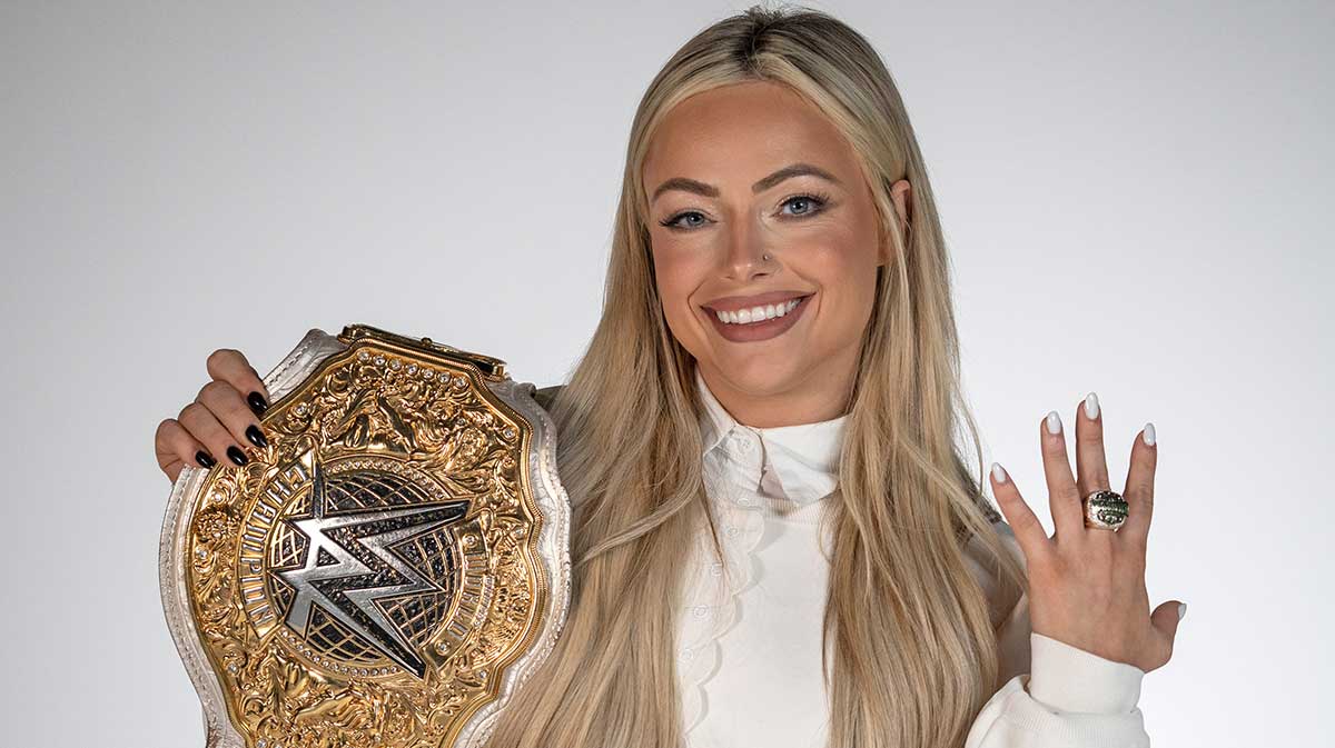 Liv Morgan posing with the Women's World Championship and Crown Jewel ring on November 3, 2024.