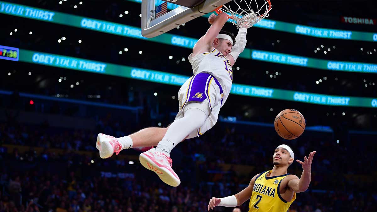 Los Angeles Lakers Guard Austin Reaper (15) Request for a basket against Indiana Pacens during the second half at the CRIPTO.com Arena. 