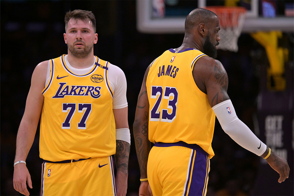 Los Angeles Lakers Guard Lubro Doncic (77) and forward Lebron James (23) in court in the first half against Jazz Utah at Cripto.com Arena.