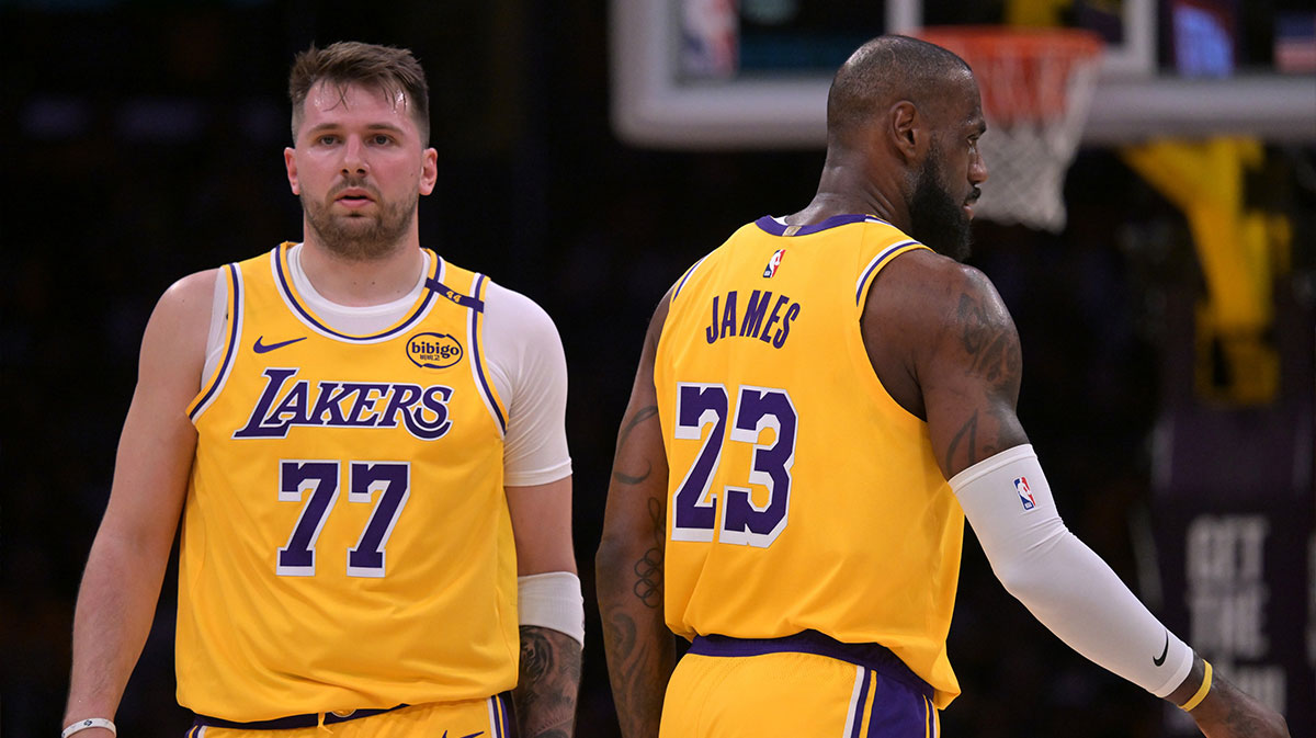 Los Angeles Lakers Guard Lubro Doncic (77) and forward Lebron James (23) in court in the first half against Jazz Utah at Cripto.com Arena. 