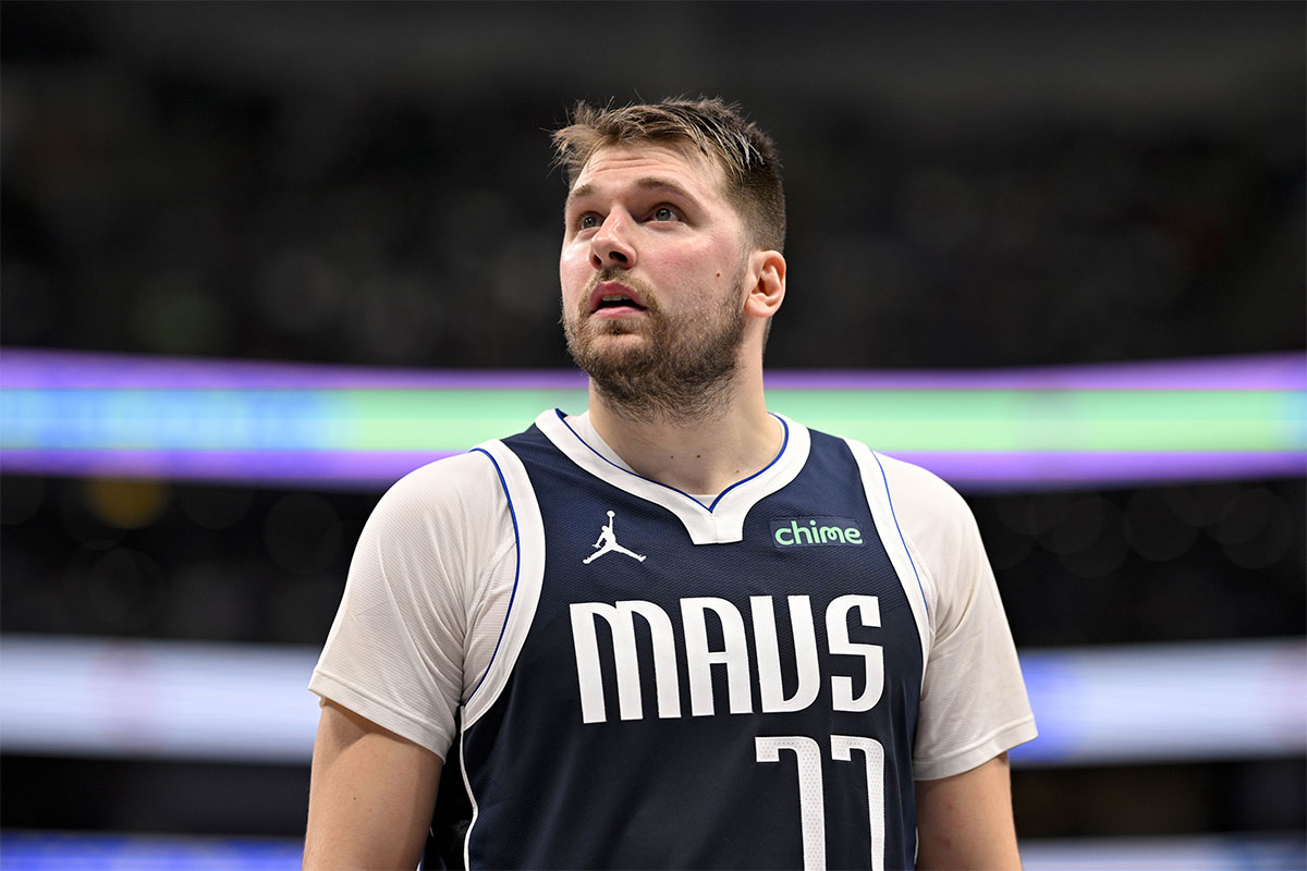 Dallas Mavericks Guard Luka Doncic (77) checks the board during the second half against Blazers Portland Trail Blazers in the center of American Airlines.