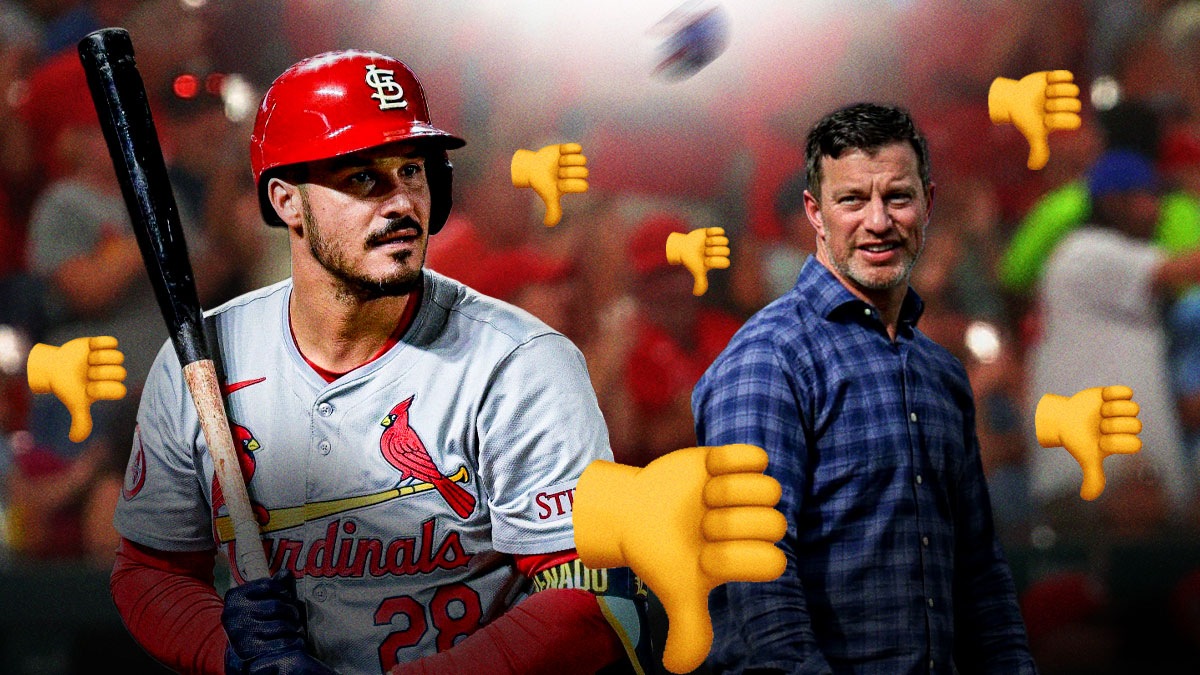 Nolan Arenado looking at Andrew Friedman with thumbs down emojis around them