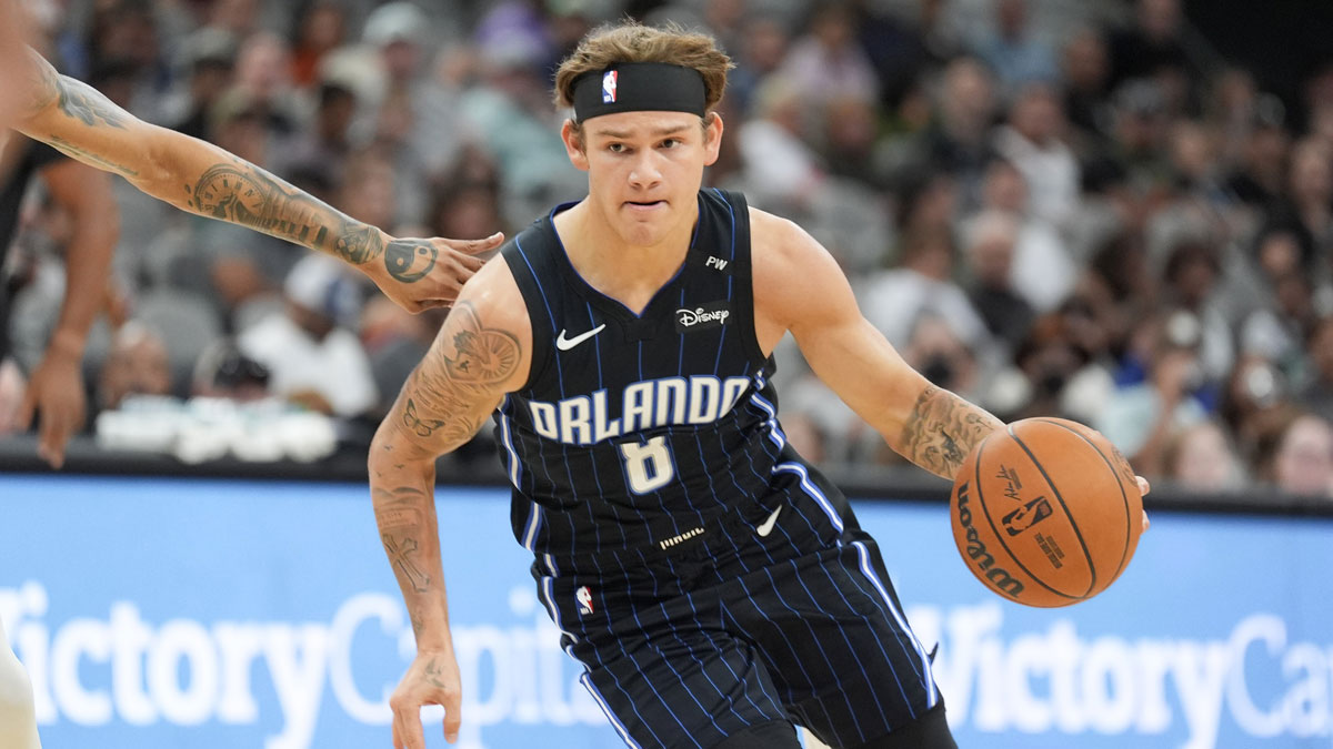 Orlando Magic guard Mac McClung (8) dribbles in the second half against the San Antonio Spurs at Frost Bank Center.