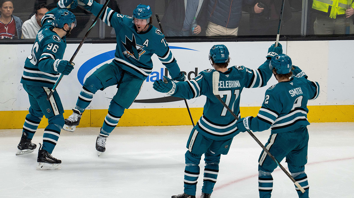 San Jose Sharks center Tyler Toffoli (73) and defenseman Jake Walman (96) and center Macklin Celebrini (71) and center Will Smith (2) celebrate after the score against the Montreal Canadiens during the third period at SAP Center at San Jose.