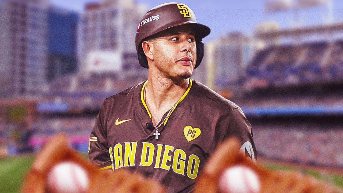 Manny Machado smiles in Padres gear