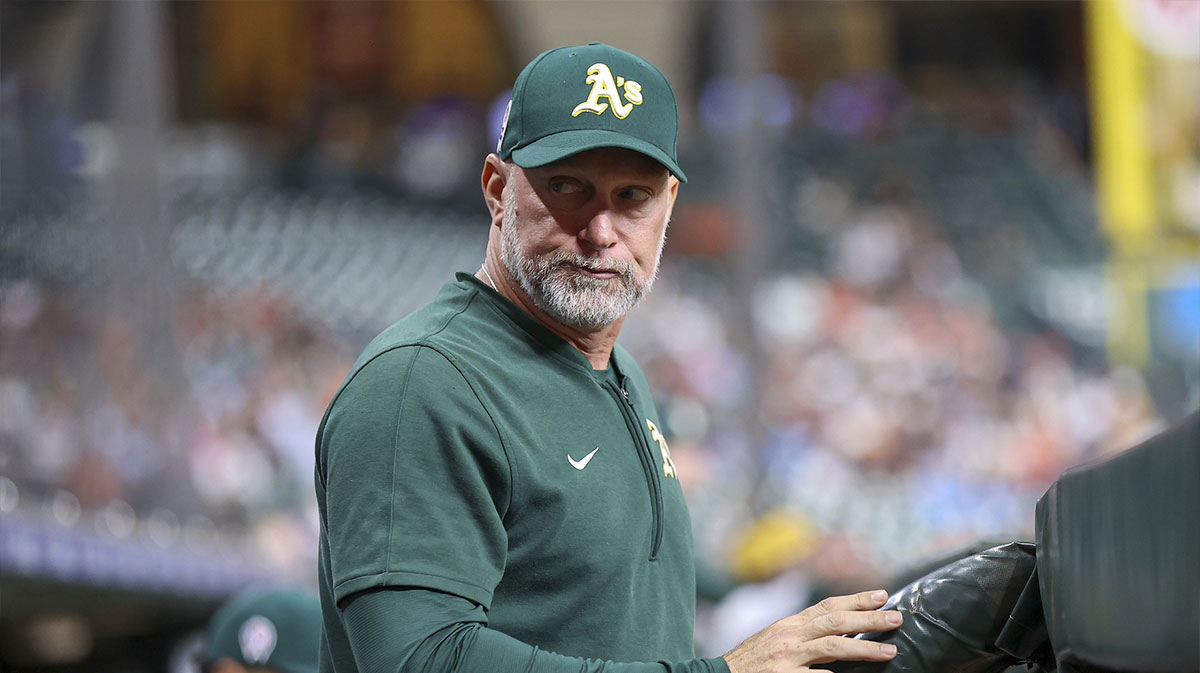 Oakland Athletics manager Mark Kotsay (7) looks on from the dugout during the game against the Houston Astros at Minute Maid Park