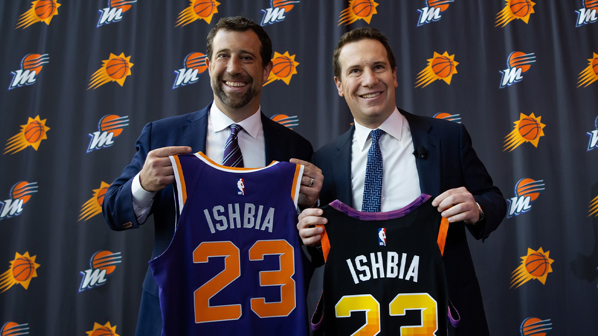 Phoenix Suns owner Mat Ishbia (right) and brother Justin Ishbia pose for a photo during an introductory press conference at Footprint Center.