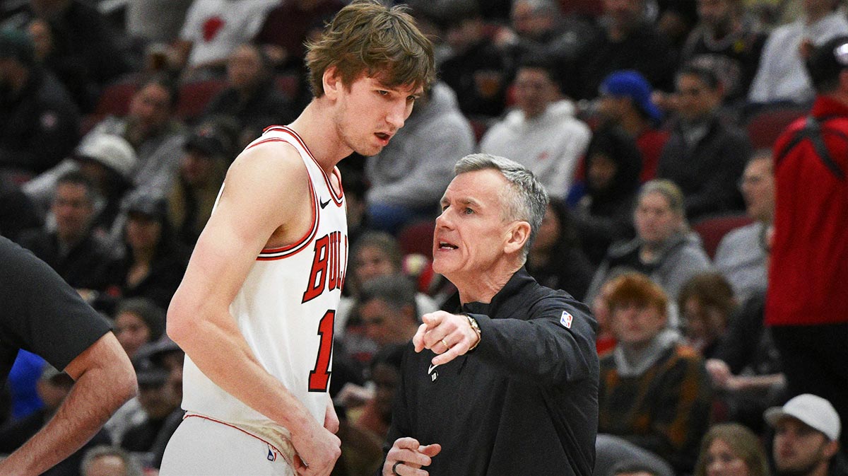 Chicago Bulls forward Matas Buzelis (14) talks with head coach Billy Donovan during the first half against the Detroit Pistons at the United Center.