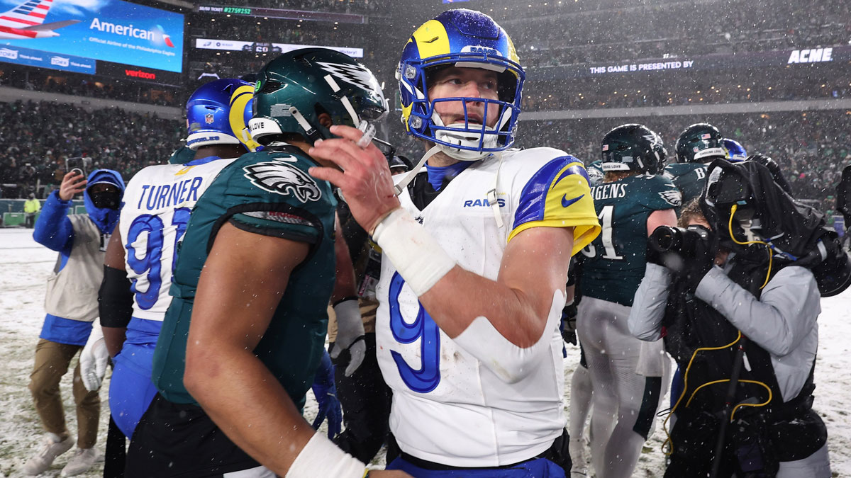 Philadelphia Eagles quarterback Jalen Hurts (1) greets Los Angeles Rams quarterback Matthew Stafford (9) after their game in a 2025 NFC divisional round game at Lincoln Financial Field