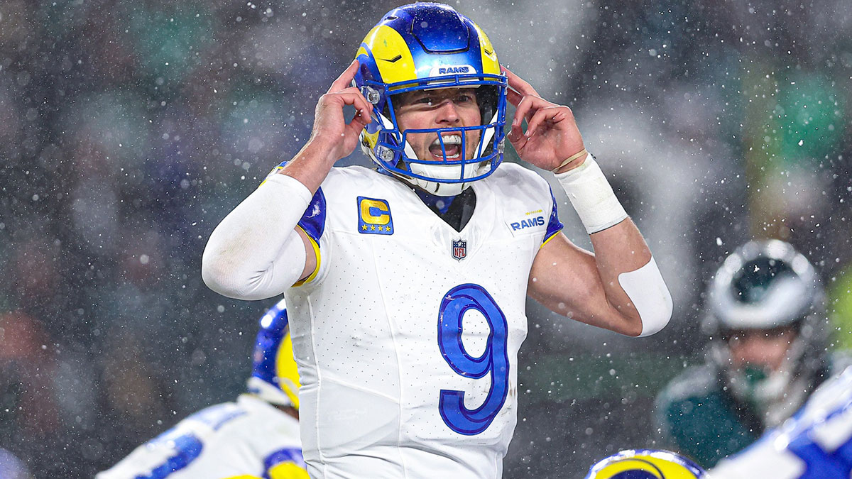 Jan 19, 2025; Philadelphia, Pennsylvania, USA; Los Angeles Rams quarterback Matthew Stafford (9) calls a play at the one of scrimmage against the Philadelphia Eagles in a 2025 NFC divisional round game at Lincoln Financial Field. 