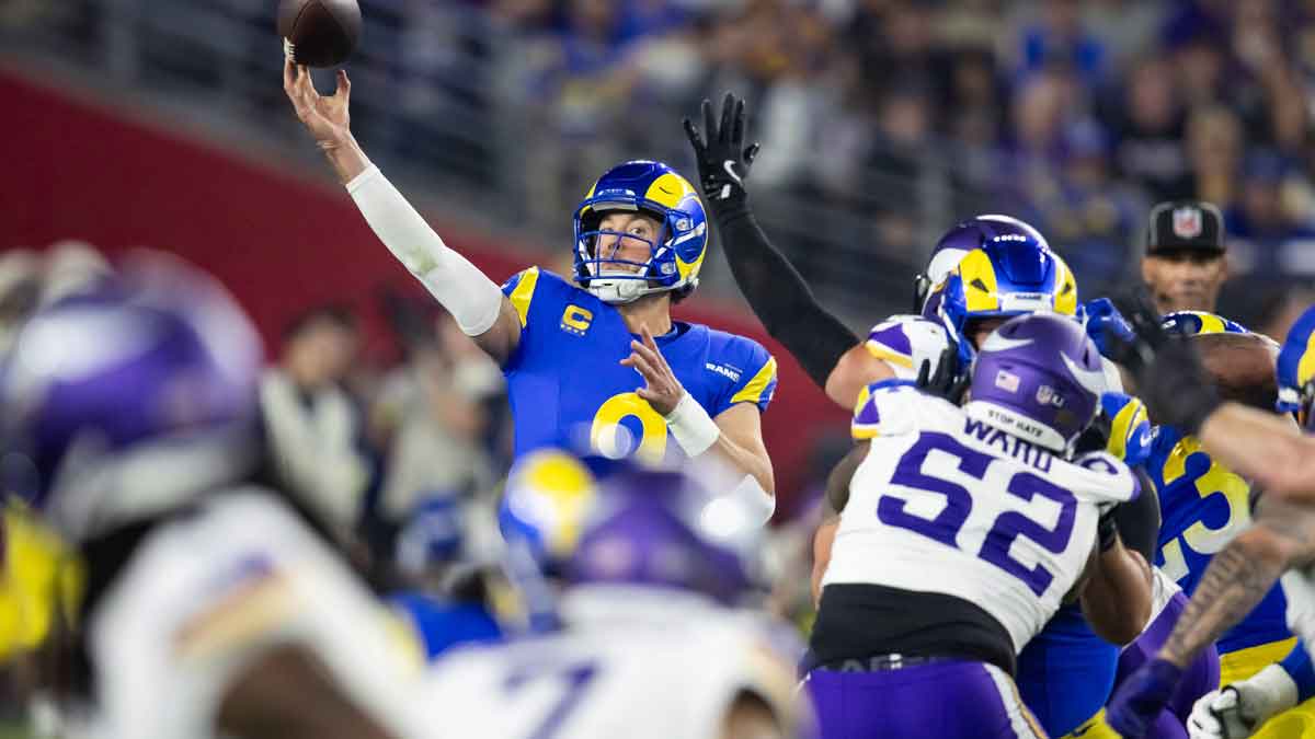 Jan 13, 2025; Glendale, AZ, USA; Los Angeles Rams quarterback Matthew Stafford (9) against the Minnesota Vikings during an NFC wild card game at State Farm Stadium.