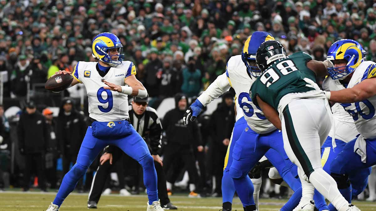 Jan 19, 2025; Philadelphia, Pennsylvania, USA; Los Angeles Rams quarterback Matthew Stafford (9) throws the ball against the Philadelphia Eagles during the first half in a 2025 NFC divisional round game at Lincoln Financial Field.