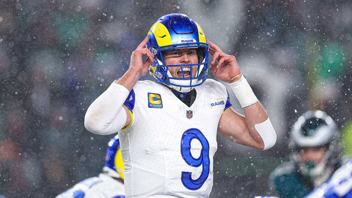 Los Angeles Rams quarterback Matthew Stafford (9) calls a play at the one of scrimmage against the Philadelphia Eagles in a 2025 NFC divisional round game at Lincoln Financial Field.