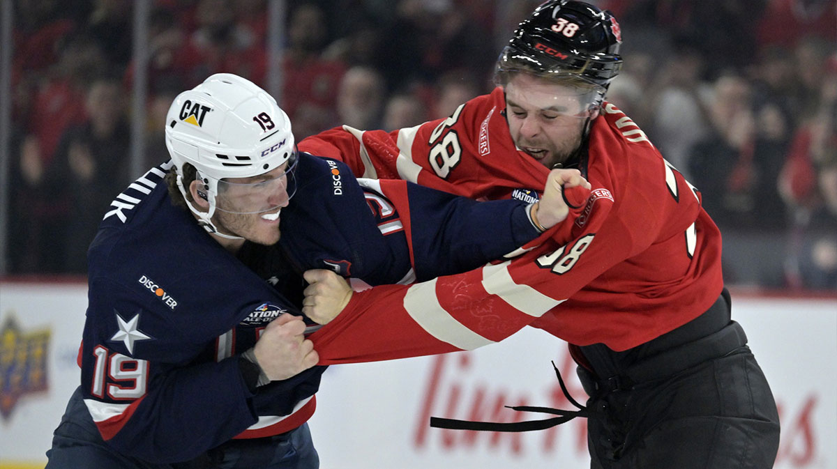 Team United States forward Matthew Tkachuk (19) and Team Canada forward brandon Hagel (38) fight in the first period during a 4 Nations Face-Off ice hockey game at the Bell Centre.