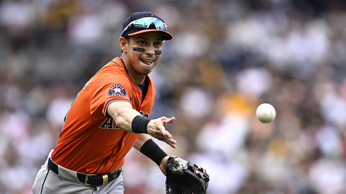 Houston Astros second baseman Mauricio Dubon (14) tosses the ball to first base on a bunt by San Diego Padres left fielder Jurickson Profar (not pictured) during the third inning at Petco Park. 