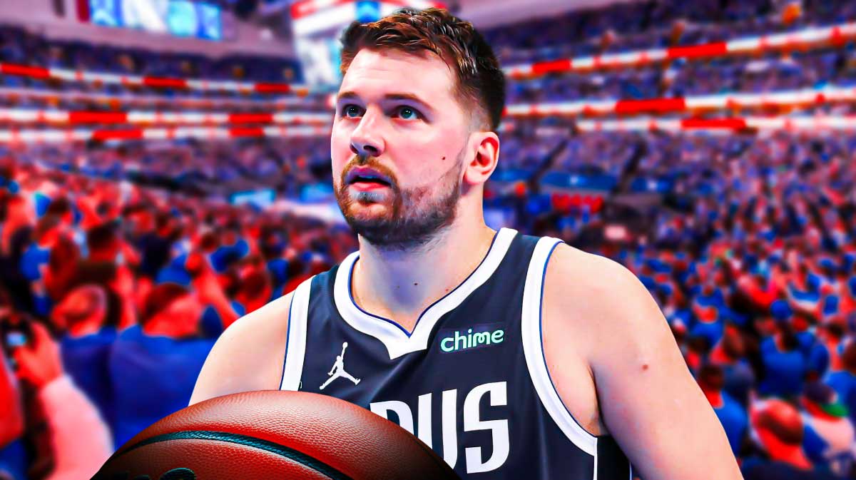 Photo: Luka Doncic in Mavs jersey looking sad, sad Mavs fans in the background