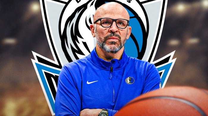Jason Kidd with stoic expression next to Mavericks logo