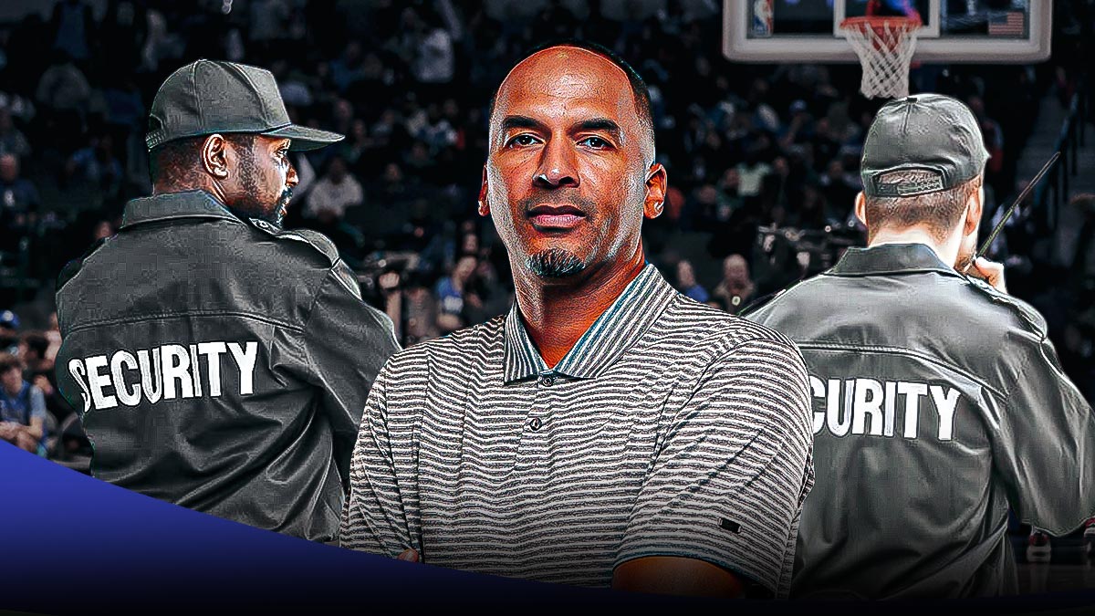Mavericks Nico Harrison (center) with security guards next to him after Luka Doncic trade