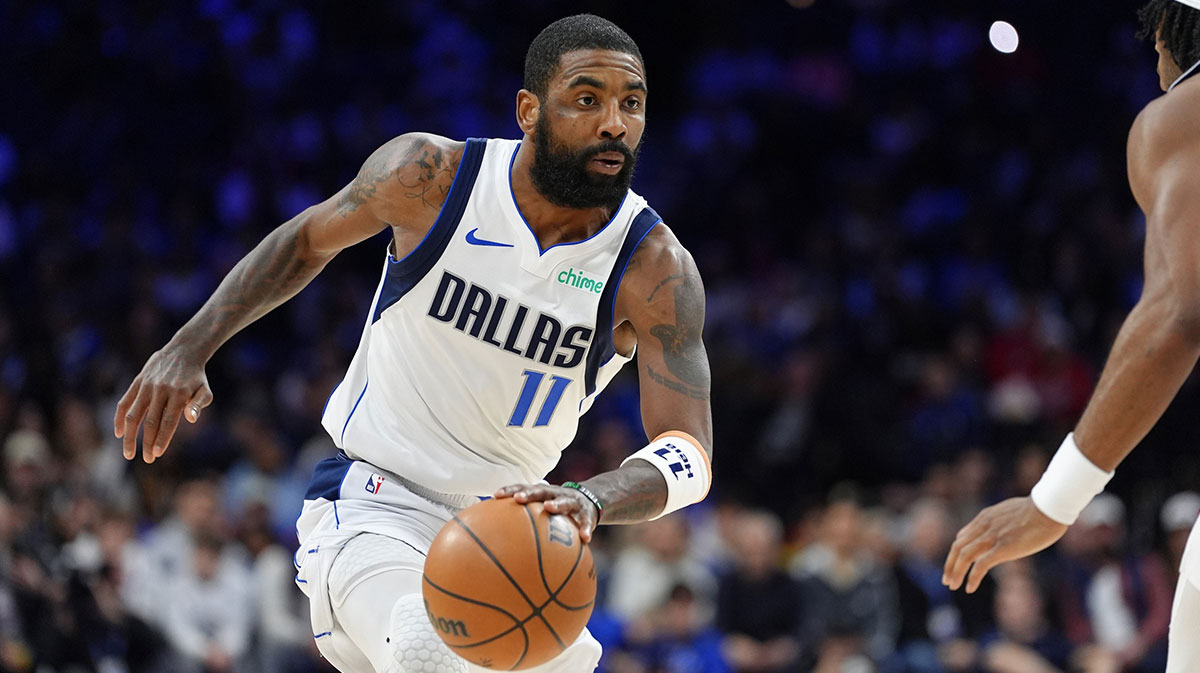 Dallas Mavericks Guard Kirie Irving (11) Drive with a ball against Philadelphia 76ers in the second quarter of the Vells Fargo Center.