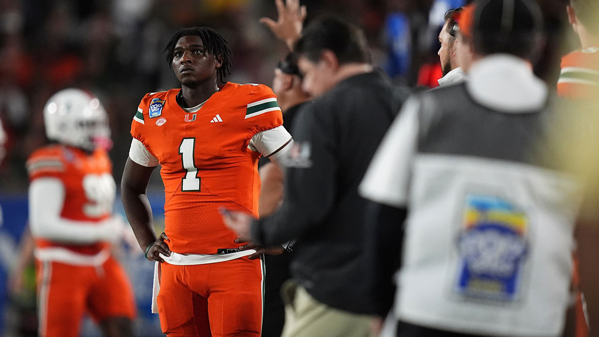 Miami Hurricanes quarterback Cam Ward (1) looks up at the scoreboard during the second half against the Iowa State Cyclones at Camping World Stadium. 