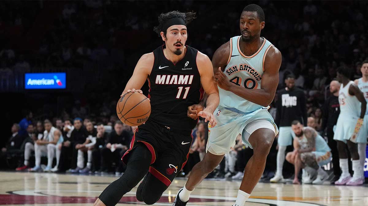 Miami Heart Guard Jaime Jakuez Jr. (11) Run next to San Antonio Spurs Preans Harrison Barnes (40) during the second half in the Cashier Center. 