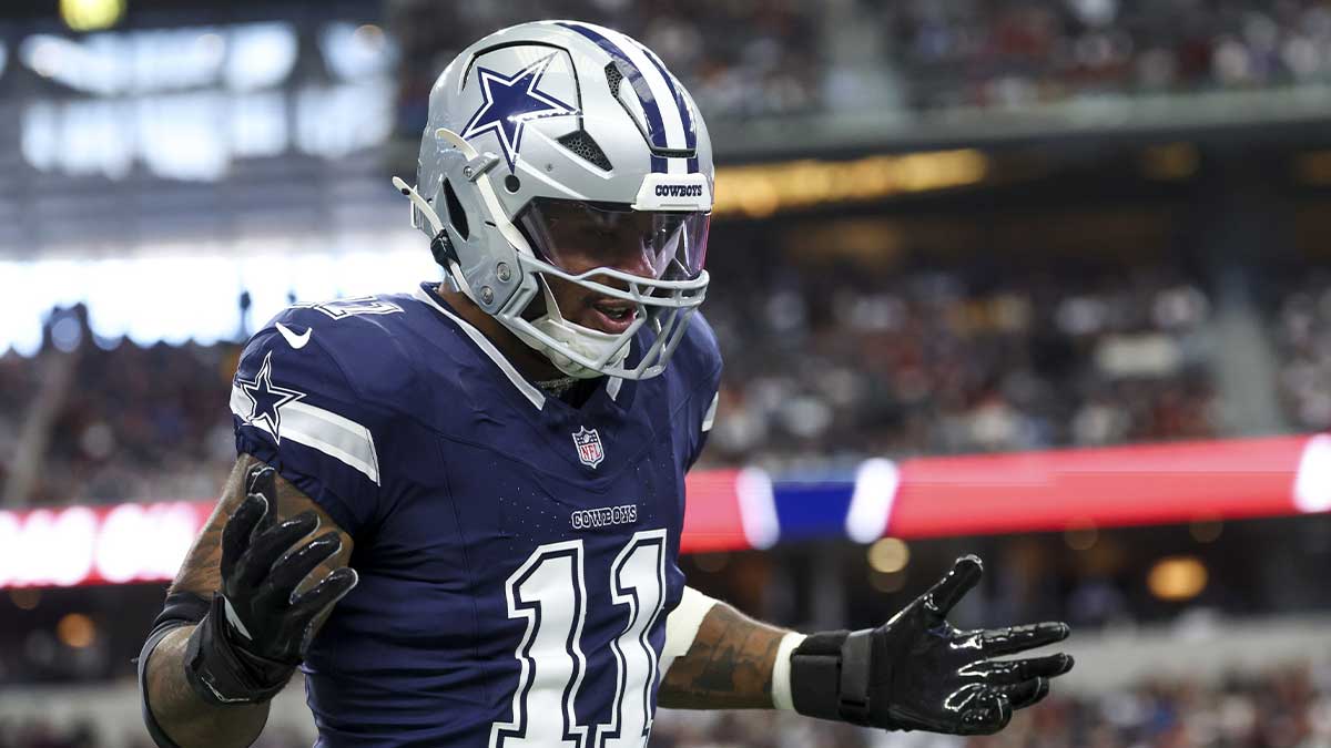 Dallas Cowboys linebacker Micah Parsons (11) celebrates after a sack during the first quarter against the Washington Commanders at AT&T Stadium.