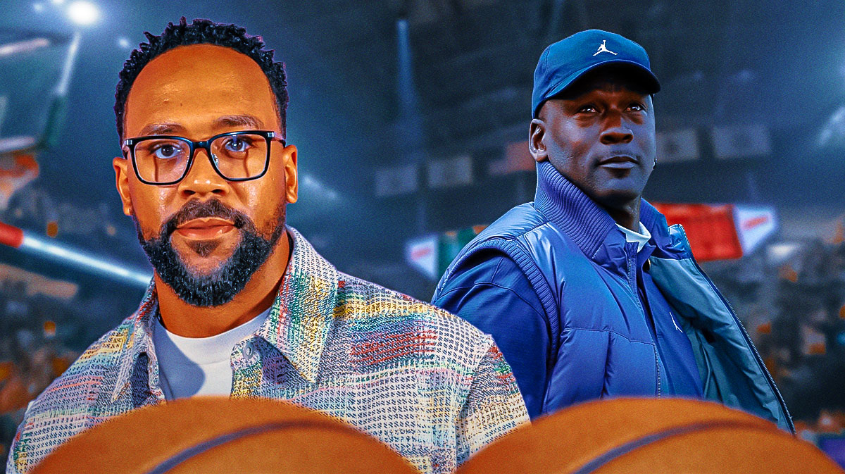 Marcus Jordan (son of Michael Jordan) looking serious with Michael Jordan