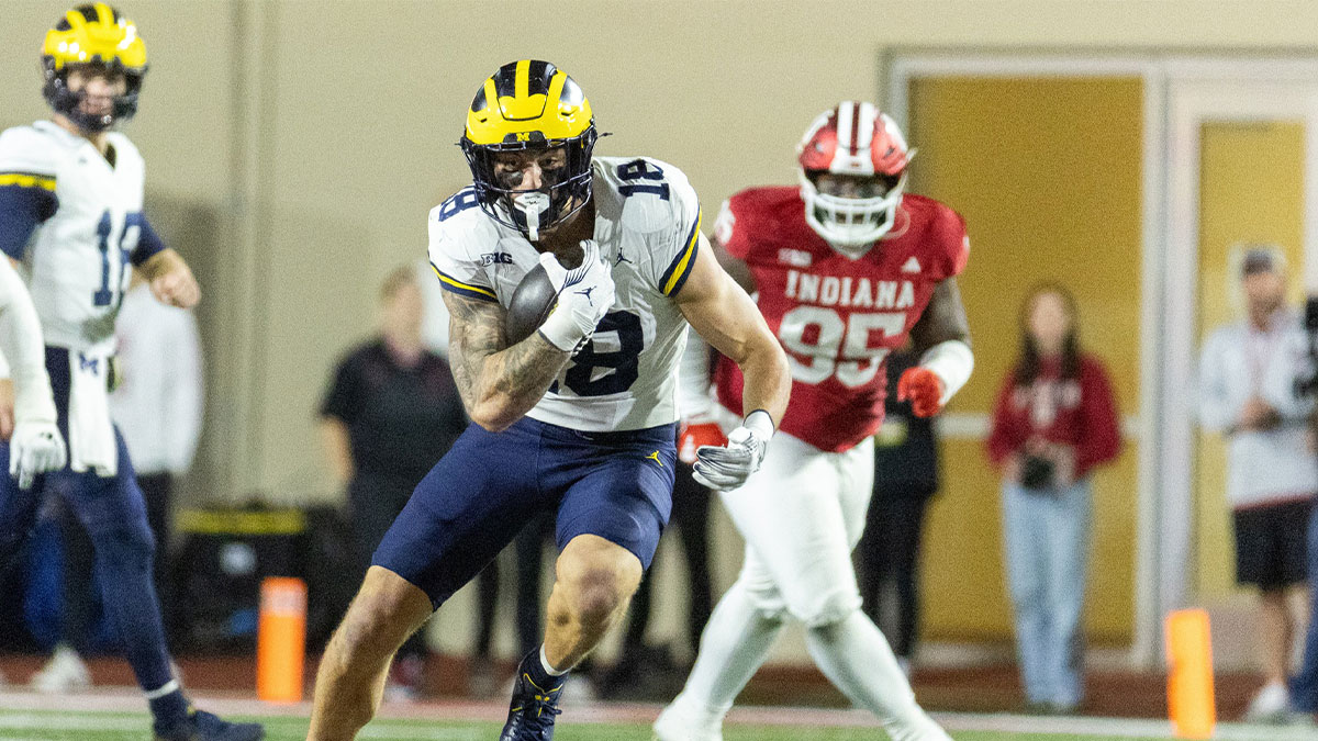 Michigan Wolverines tight end Colston Loveland (18) runs with the ball in the second half against the Indiana Hoosiers at Memorial Stadium.