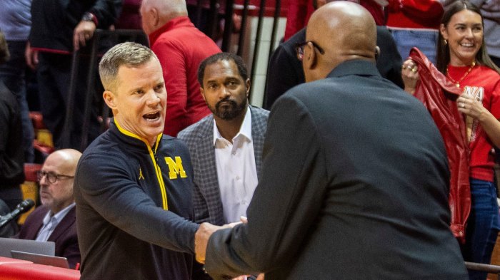 Michigan coach Dusty May shakes hand with Indiana coach Mike Woodson the Indiana vs. Michigan game at Simon Skjodt Assembly Hall