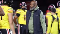 Maryland Terrapins head coach Mike Locksley interacts with players before a game against the Rutgers Scarlet Knights at SECU Stadium.