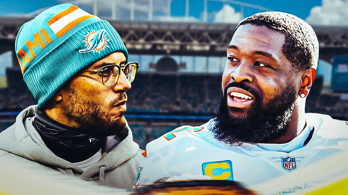 Miami Dolphins head coach Mike McDaniel and Terron Armstead in front of Hard Rock Stadium.