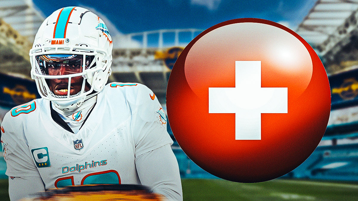Tyreek Hill (Dolphins) with medical cross symbol