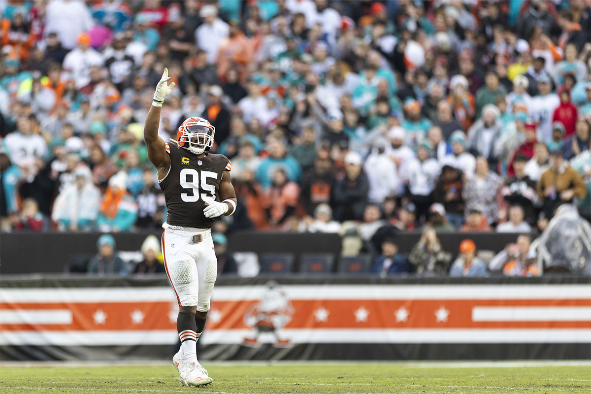 Dec 29, 2024; Cleveland, Ohio, USA; Cleveland Browns defensive end Myles Garrett (95) celebrates his sack against the Miami Dolphins during the first quarter at Huntington Bank Field. 