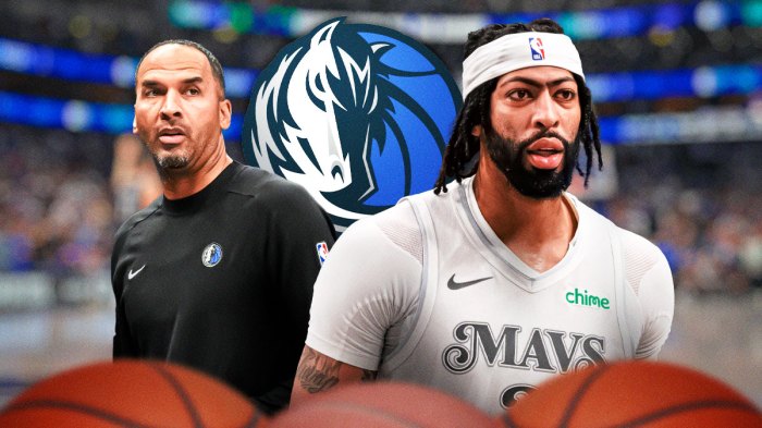 Mavericks forward Anthony Davis next to Mavericks GM Nico Harrison with the Mavericks logo in the background on a Mavericks contract extension