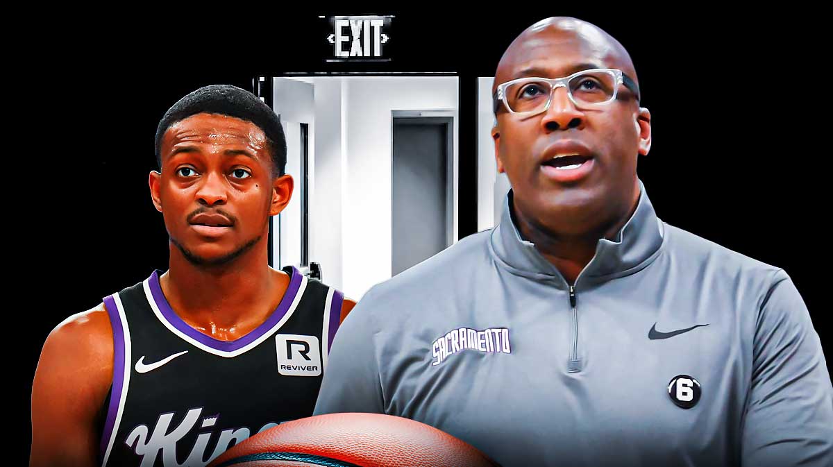 Photo: De'Aaron Fox in Kings jersey, Mike Brown beside him, have an open door behind both of them
