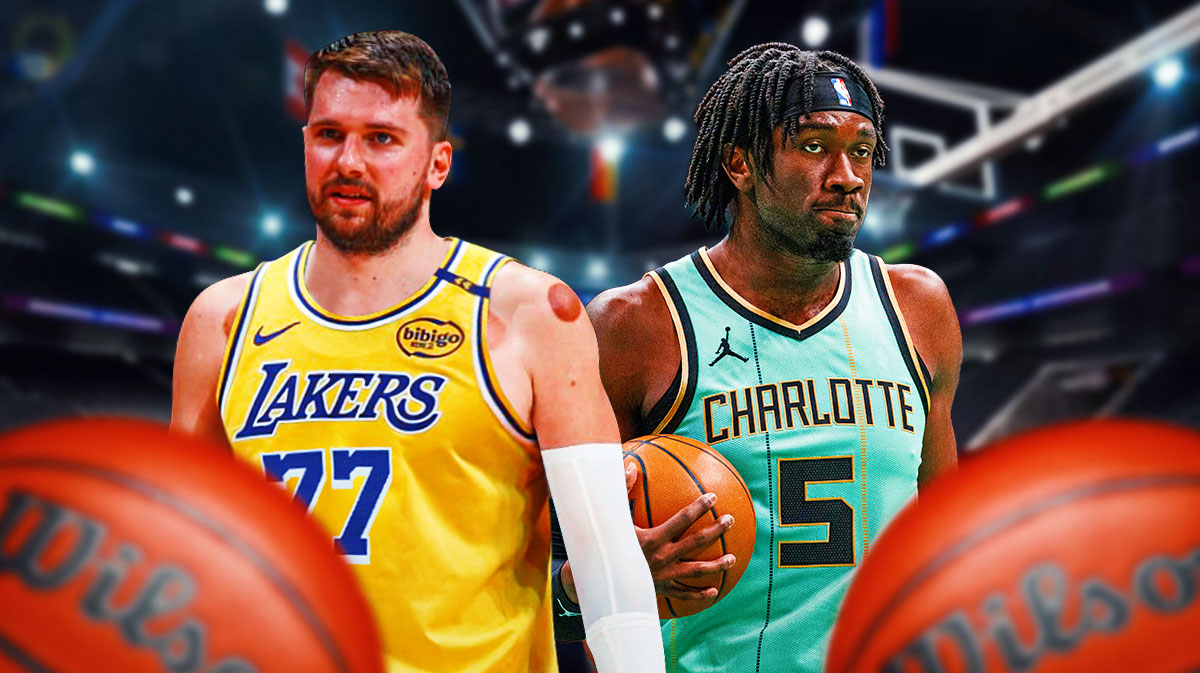 Los Angeles Lakers Luka Doncic next to Hornets' Mark Williams in front of Crypto.com Arena.