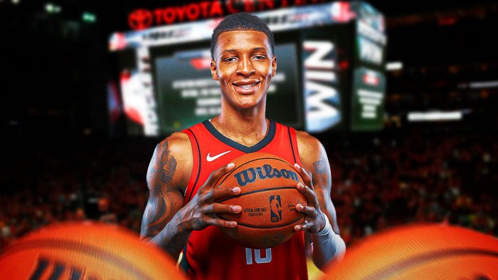 Jabari Smith Jr. smiles in Rockets jersey