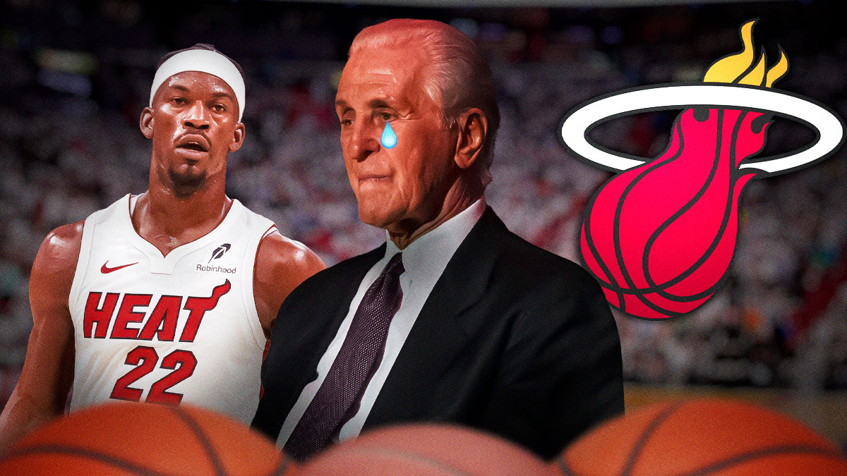 Former Heat forward Jimmy Butler next to Heat president Pat Riley with teary eyes on Riley's face and the Heat logo in the background